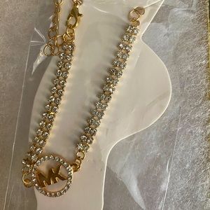 “MK” anklet, new in package